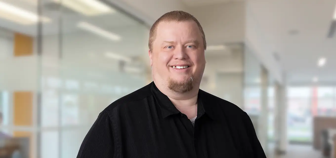 Smiling portrait of Aaron Delong